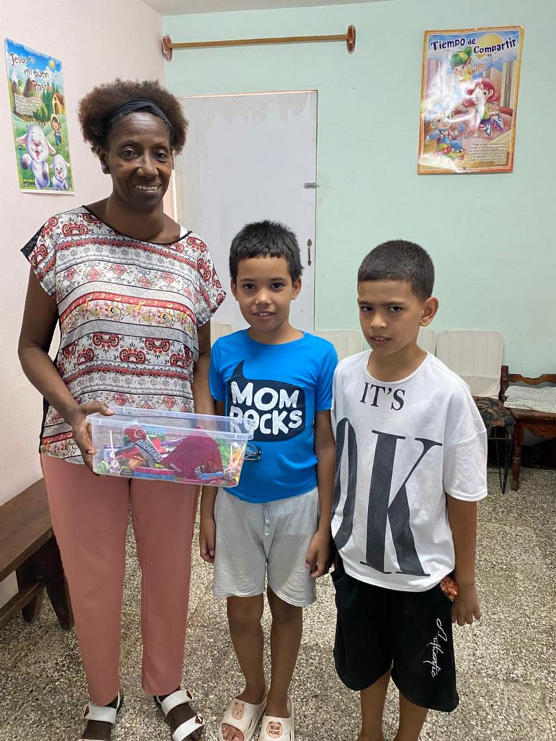 Adult with two boys