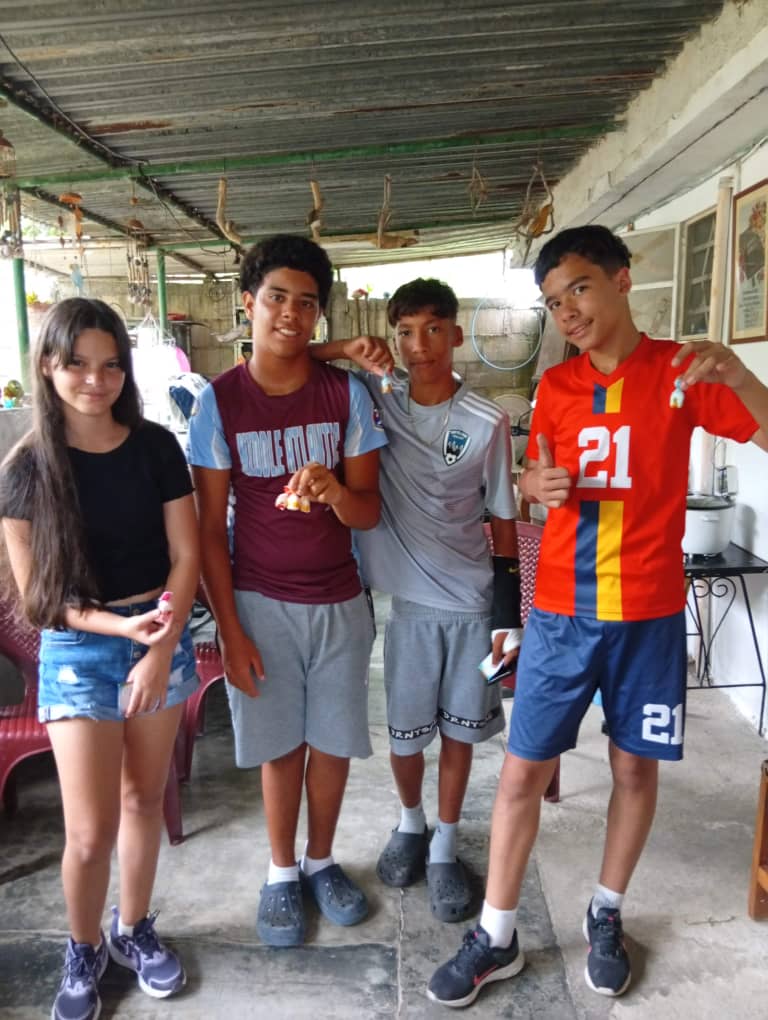 Four youth standing