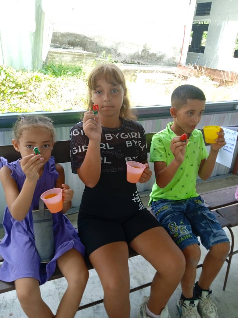 Three children on bench